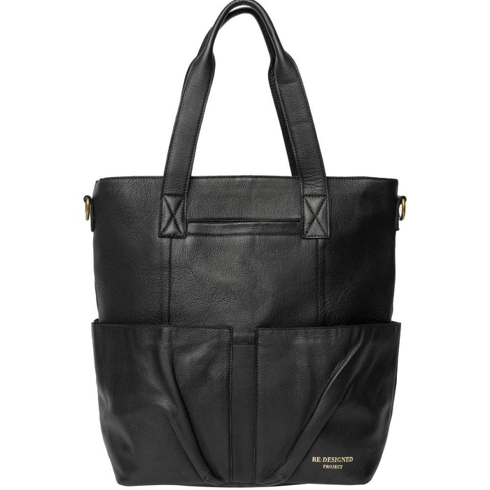 Black leather knitting bag with shoulder handles, crossbody strap, and multiple pockets for organizing crafting essentials.