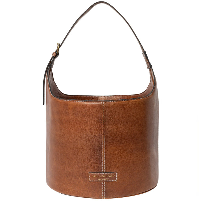 Small bucket bag in walnut leather with sturdy design and comfortable handle for knitters.