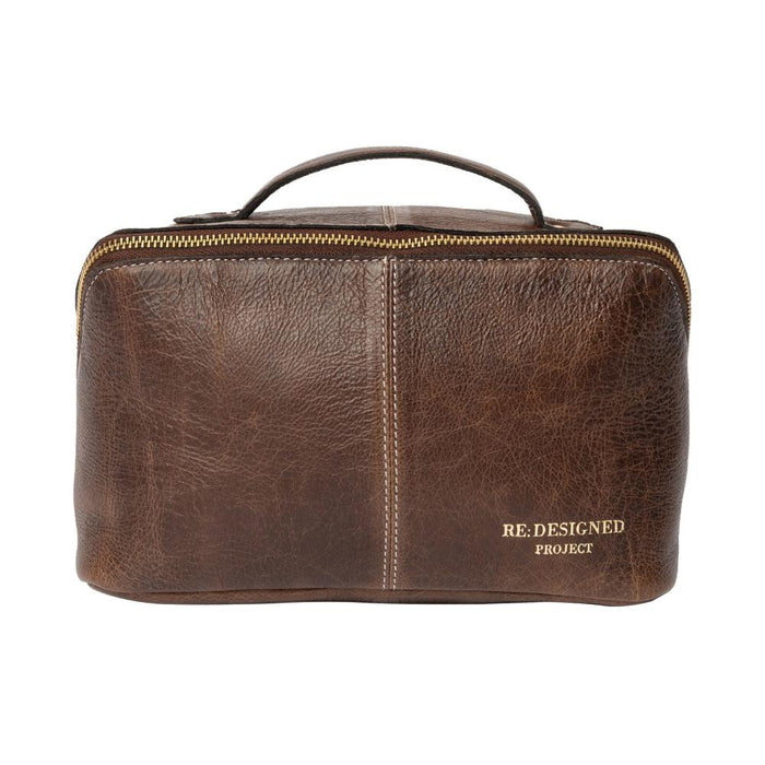 Premium leather knitting project bag in woodsmoke color with a patinated finish, featuring dedicated compartments for knitting tools.