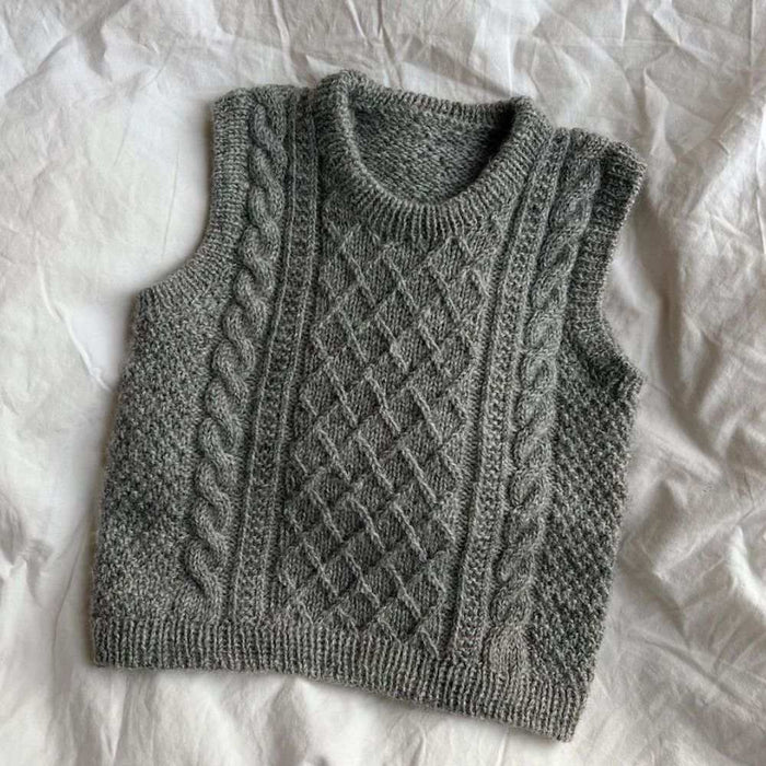 Moby Slipover Baby knitting pattern featuring textured cable design by PetiteKnit.