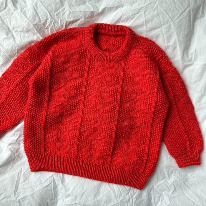 Red Esther Sweater Junior with textured pattern, suitable for ages 1-14 years, top-down knitting pattern.