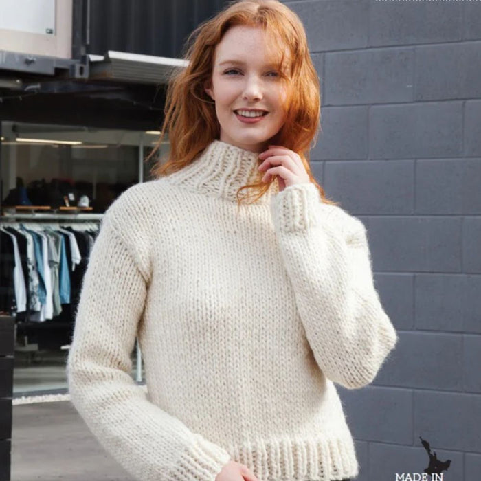 High neck sweater crafted with Crucci Natural Wonder 18 Ply pure wool, featuring knitting pattern CRU1496.