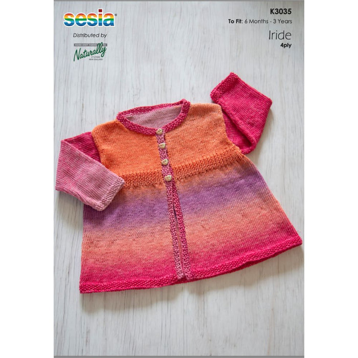 Knitting pattern for little girls' jacket in Sesia Iride 4ply yarn, featuring moss stitch edges and buttoned front.