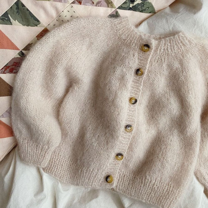 PetiteKnit Novice Cardigan Mini Mohair Edition displayed on fabric background.