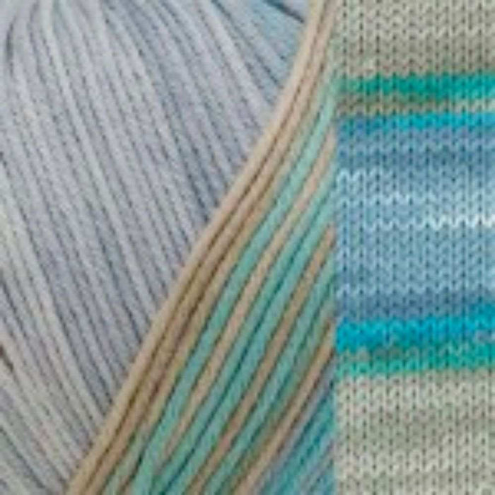 Crossover Jacket & Hat Knit Kit in variegated yarn close-up showing knitting texture and pastel colors.