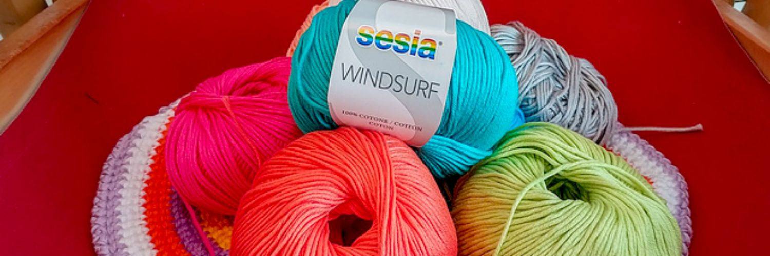 Close-up of colorful Sesia Windsurf mercerised cotton yarn skeins