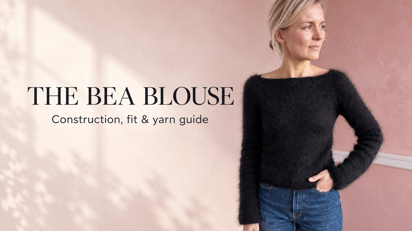 Black PetiteKnit Bea Blouse knitted in silk mohair, shown from the front with a wide boat neckline and softly shaped sleeves.