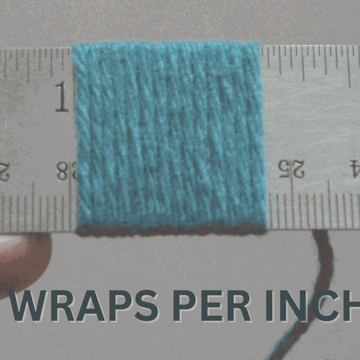 Yarn wrapped around ruler measuring Wraps Per Inch (WPI) for yarn weight determination
