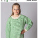 Children's colour slip stitch sweater in two-tone knitting pattern with round neckline and long sleeves