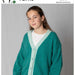 Children's V-neck Contrast Band Cardigan knitted with Alpaca Yarns Halo, featuring long sleeves and five sizes from 6 to 14 years.