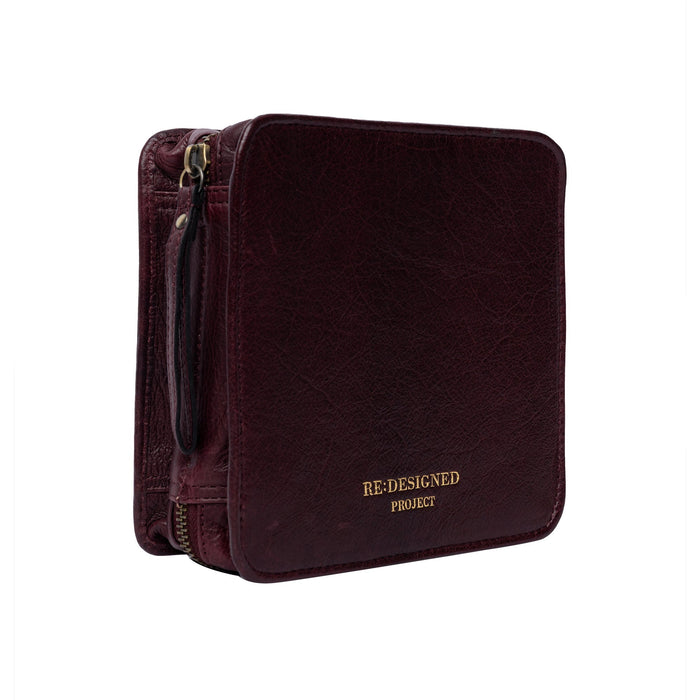 Project 83 needle organizer in dark cherry leather, compact and spacious for interchangeable circular needles.