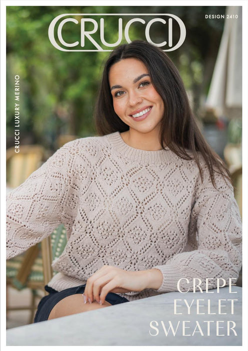 Elegant Crucci luxury merino crepe eyelet sweater with relaxed fit and textured lace design