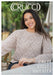 Elegant Crucci luxury merino crepe eyelet sweater with relaxed fit and textured lace design