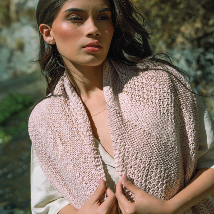Long rectangular Ulta Shawl knit in organic cotton with repeating stitch pattern