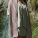 Long rectangular Ulta Shawl knitted in textured organic cotton with repeating stitch pattern