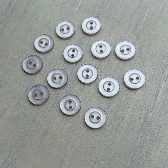 Abbey Purely Wool 2-Hole Buttons – Parchment-Buttons-Trendy Trims-11.5 mm (18L)-Wild & Woolly Yarns
