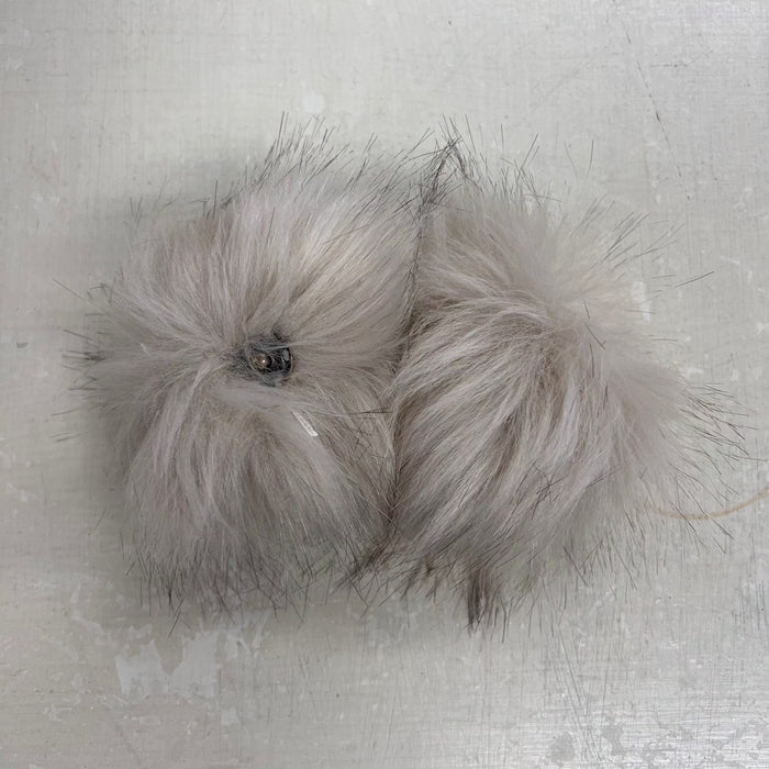 Faux fur pom poms with snap fastener, approximately 10cm, fluffy and ideal for beanies and hats.