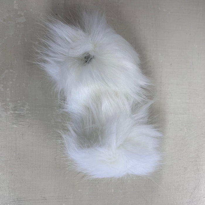 Faux fur pom pom with snap fastener, 12cm diameter, ideal for beanies and accessories.