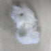 Faux fur pom pom with snap fastener, 12cm diameter, ideal for beanies and accessories.