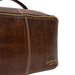 Knitting project bag in woodsmoke leather, durable and stylish with ample space for sweater projects.