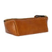 Triangular leather knitting accessory case in burned tan with gold zipper.