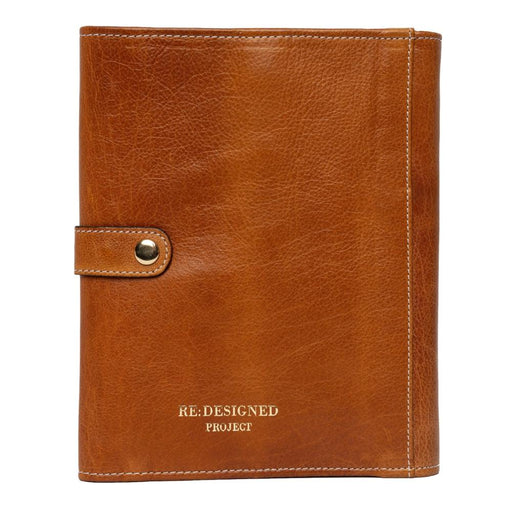 XL interchangeable knitting needle case in burned tan/gold leather with secure snap closures and multiple pockets.