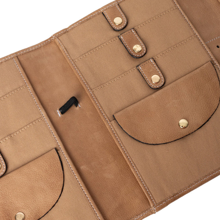 Taupe interchangeable needle case with multiple pockets and snap closures for knitting accessories.