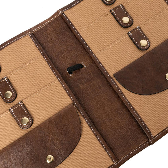 Leather knitting needle case with multiple pockets and snap closures in woodsmoke color.