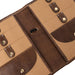 Leather knitting needle case with multiple pockets and snap closures in woodsmoke color.