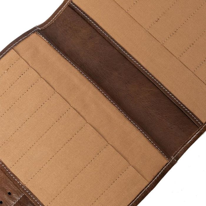 Knitting needle case in woodsmoke leather with multiple pockets for organizing.