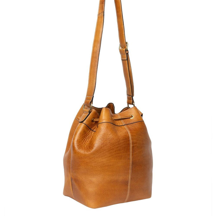 Genuine leather knitting bag in burned tan with gold accents, featuring handcrafted design, adjustable strap, and multiple pockets.