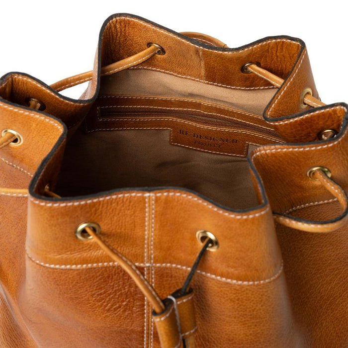 Genuine leather knitting bucket bag with drawstring in burned tan/gold.