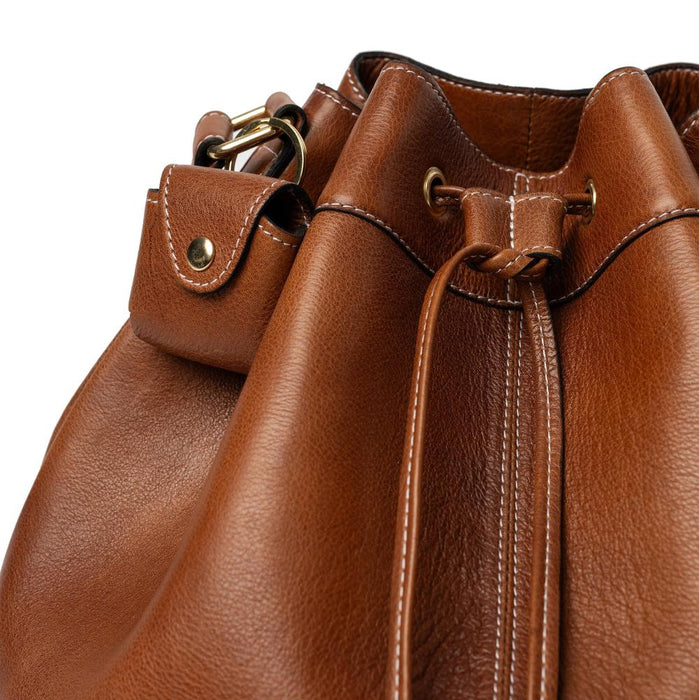 Genuine leather bucket bag in walnut with drawstring and adjustable strap, perfect knitting bag.