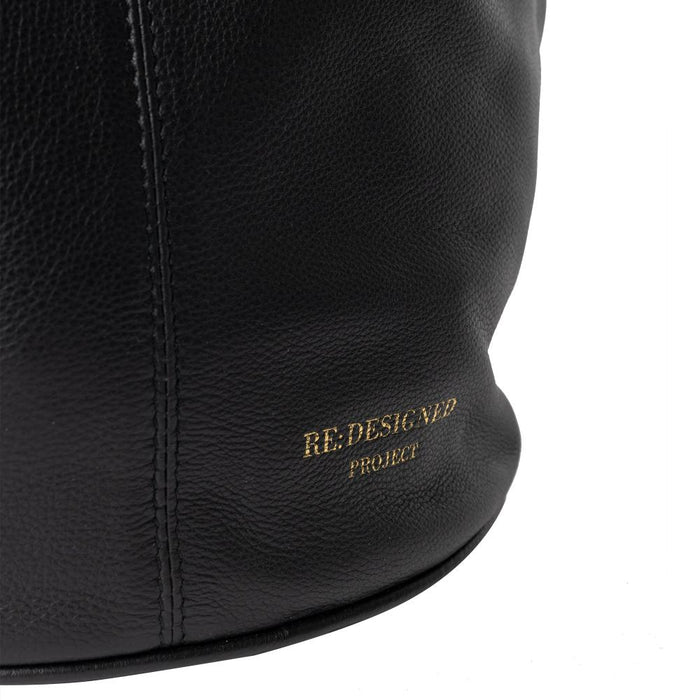 Black leather Project 24 Project Backpack with multiple pockets, perfect knitting bag for stylish organization.
