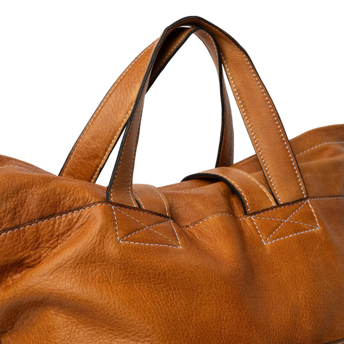 Project 24 Backpack in Burned Tan leather with multiple pockets, ideal for stylish organization.