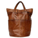 Knitting bag in walnut leather with multiple pockets for yarn and accessories.