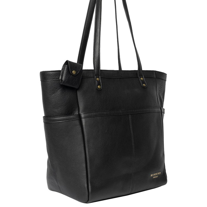 Black leather knitting bag with shoulder handles, handcrafted with compartments, metal zipper, and keyring.