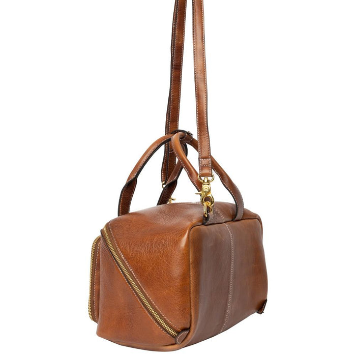 Knitting project bag in walnut and gold leather with handles and spacious compartments.