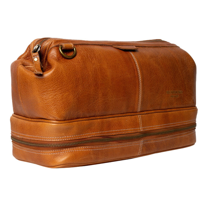 Premium leather knitting project bag in burned tan with compartments.