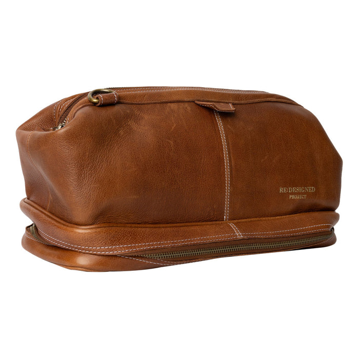 Walnut leather knitting project bag with circular needle compartment and shoulder strap.