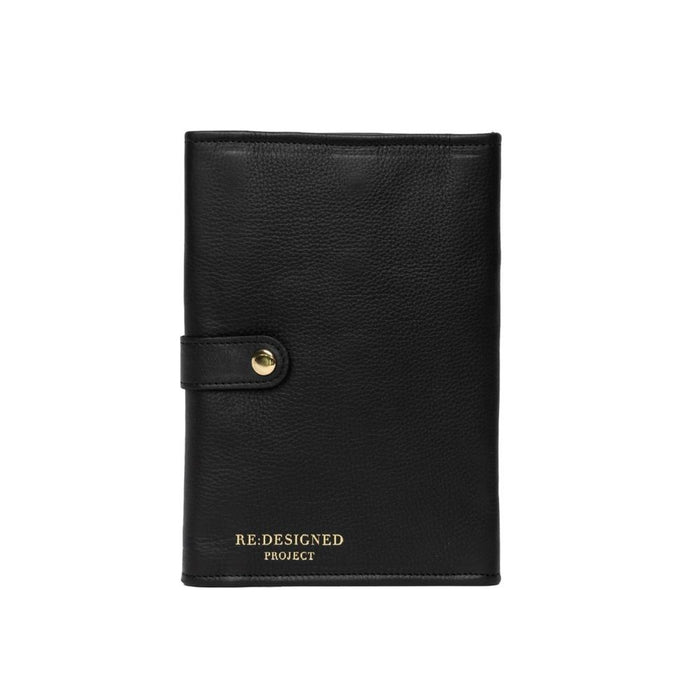 Black and gold leather circular needle knitting case with snap closures and zippered pocket.
