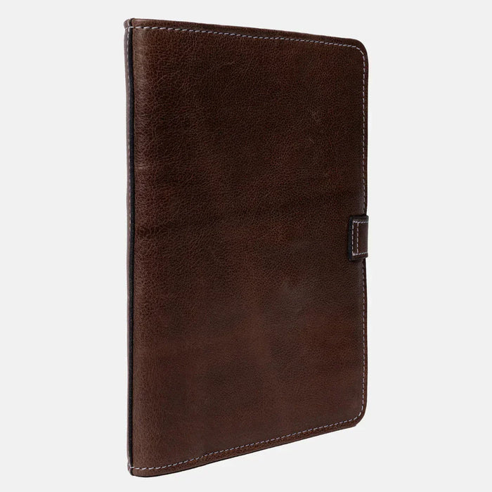 Knitting needle case in woodsmoke leather with snap and zippered pockets.