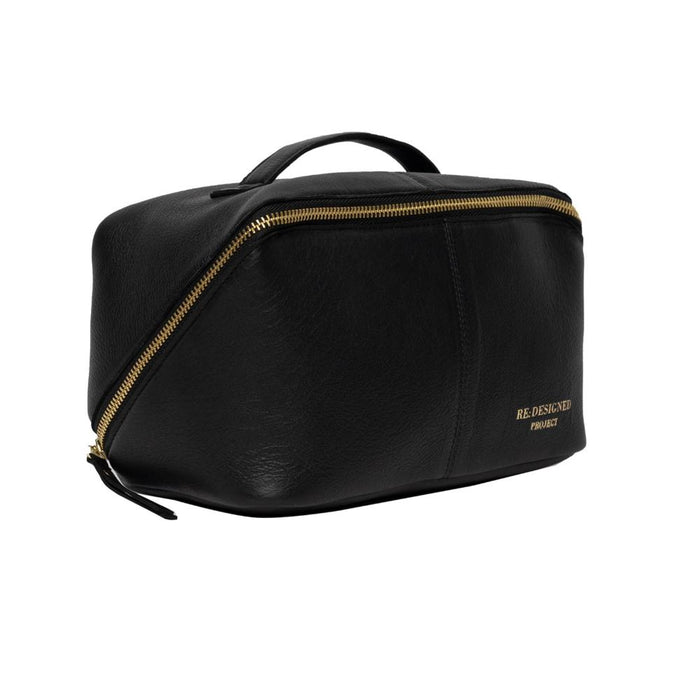 Black and gold leather knitting bag with a looped pocket for needles, crafted for durability and style.