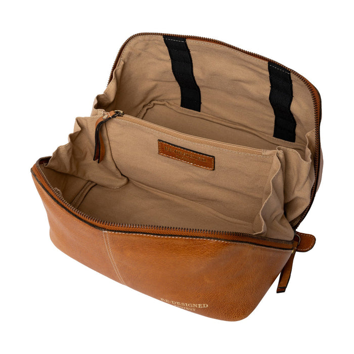Burned tan leather Project 9 knitting bag with brass accents, featuring organized compartments for knitting tools.