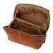 Knitting bag in burned tan and gold leather with multiple compartments.