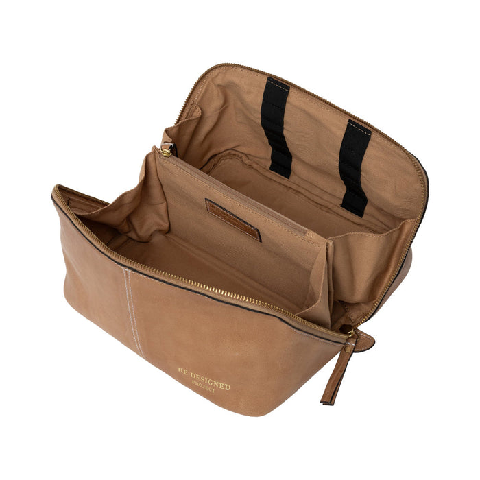 Taupe leather knitting project bag with organized compartments for tools and supplies.