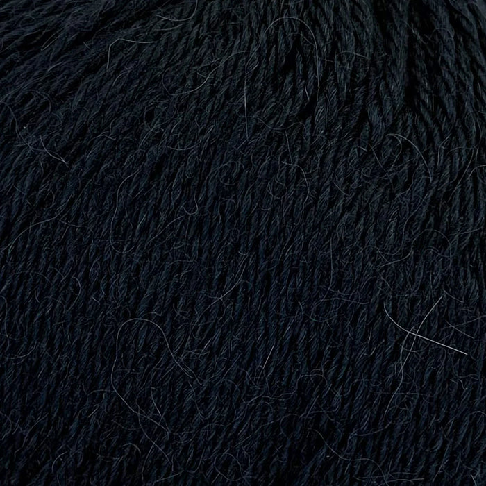 Soft baby alpaca yarn for Slouch Beanie Knit Kit in Castleton Green shade.