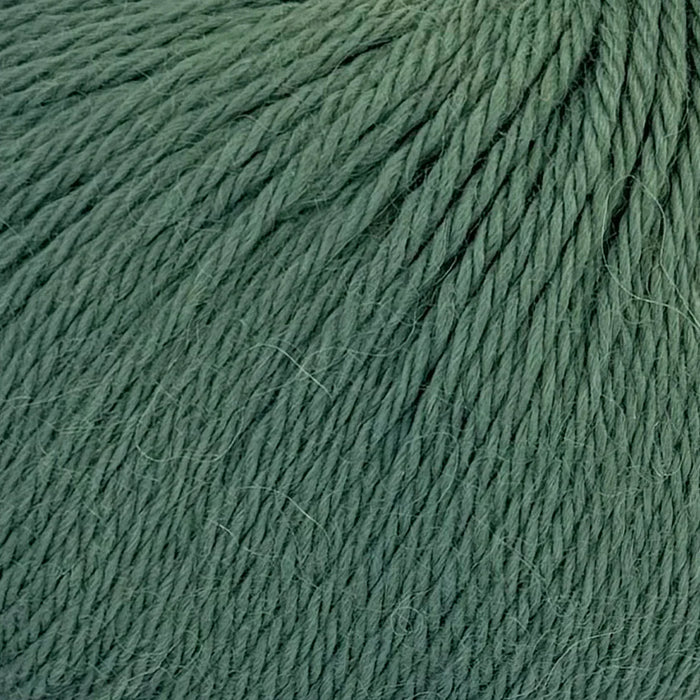 Soft baby alpaca yarn in Castleton Green for slouch beanie knit kit.
