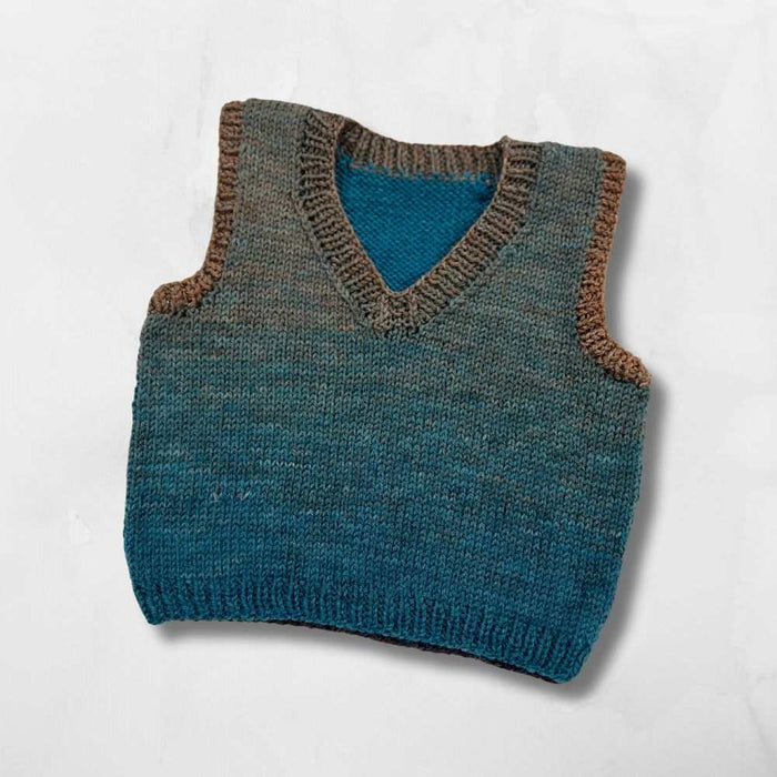 Cardigan & Vest Knit Kit for babies and toddlers, featuring a hand-knit vest made with Sesia Talent 4ply variegated yarn.