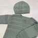 Knit textured sweater and hat set in gray, showcasing stripes and diamond patterns.